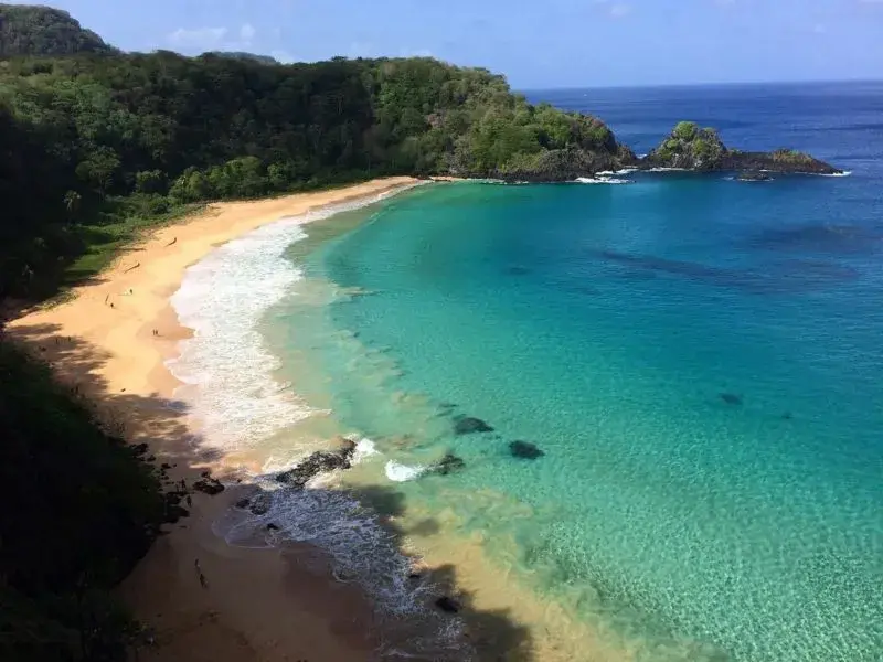 Original turquoise shoreline before Nano Banana edits.